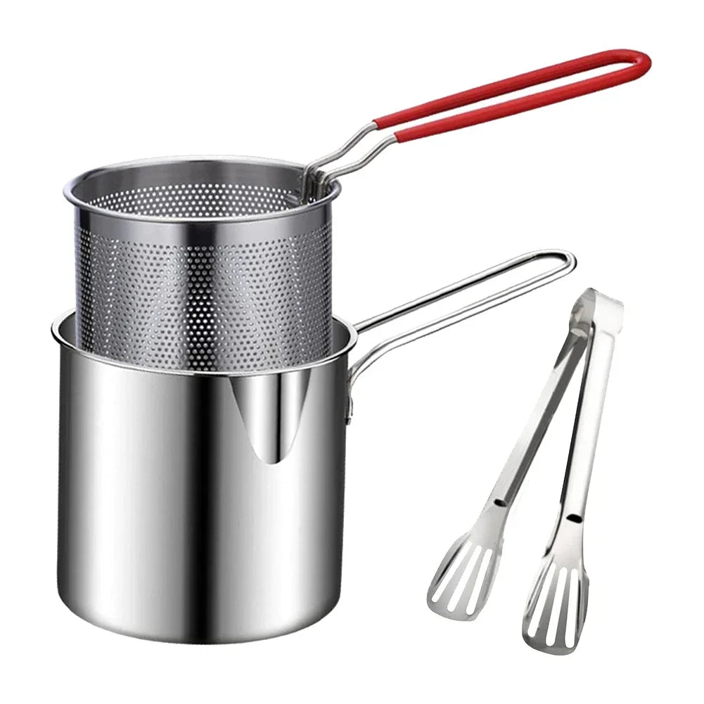 Stainless steel pot with red handle and metal tongs on a white background