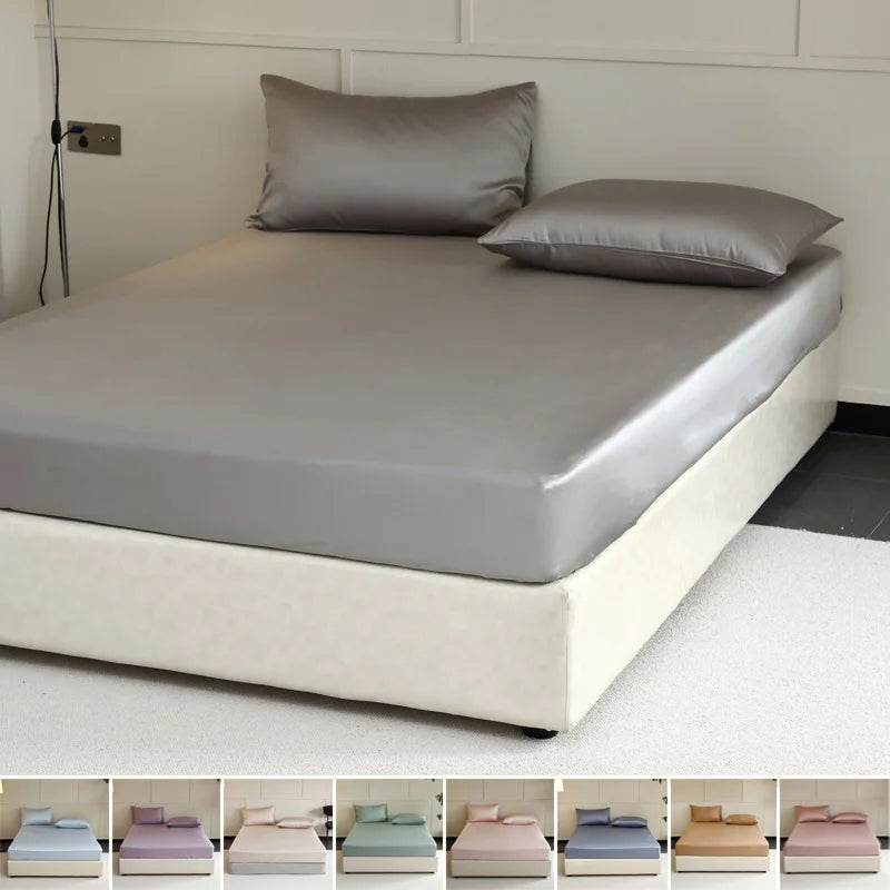 Gray fitted sheet on a bed with color swatches below