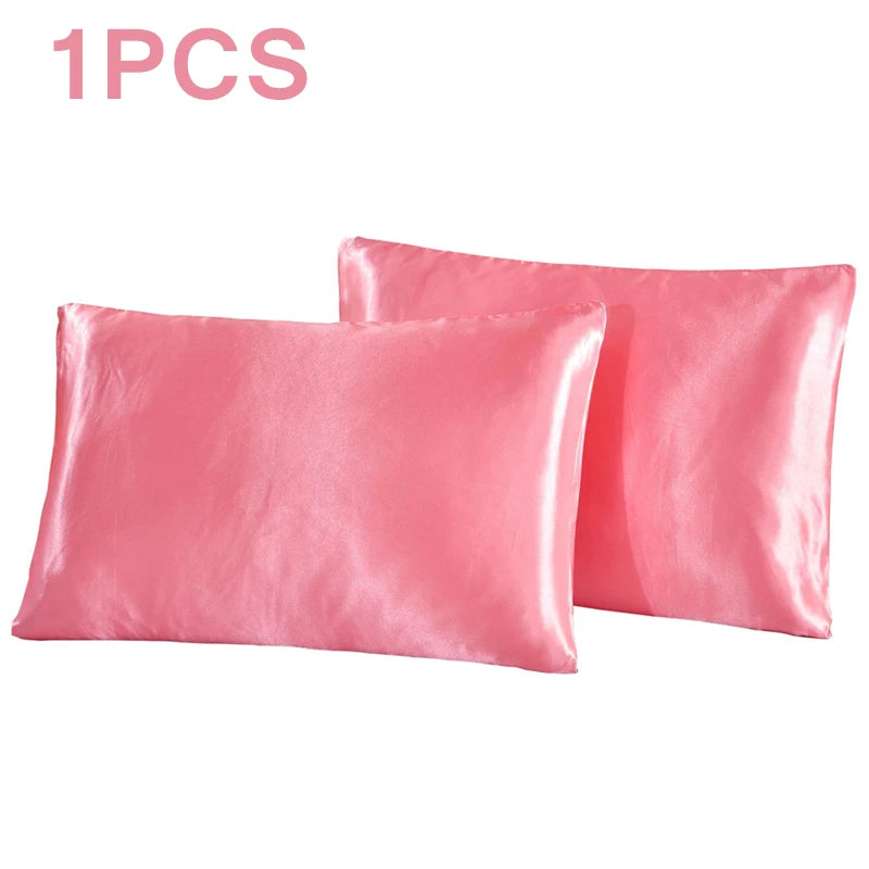 Two pink satin pillowcases on a white background with '1PCS' text above.