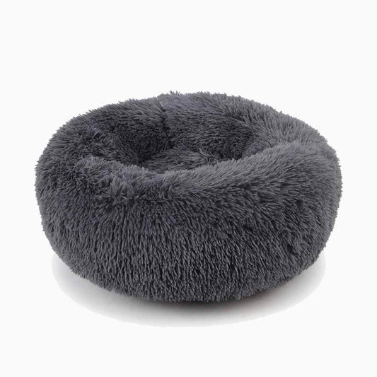 Fluffy gray pet bed on a white background