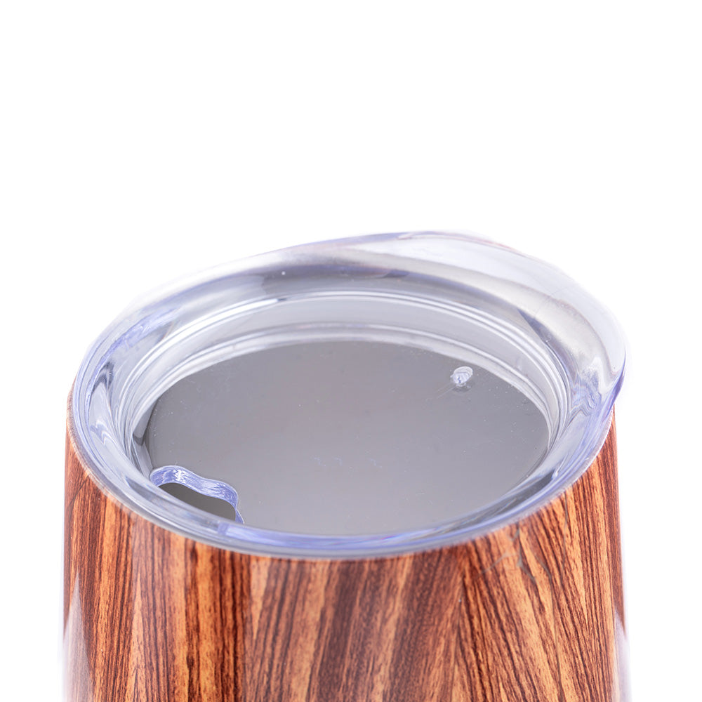 Wooden tumbler with a clear lid on a white background