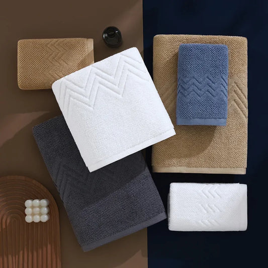 Set of bath mats in various colors on a dark background