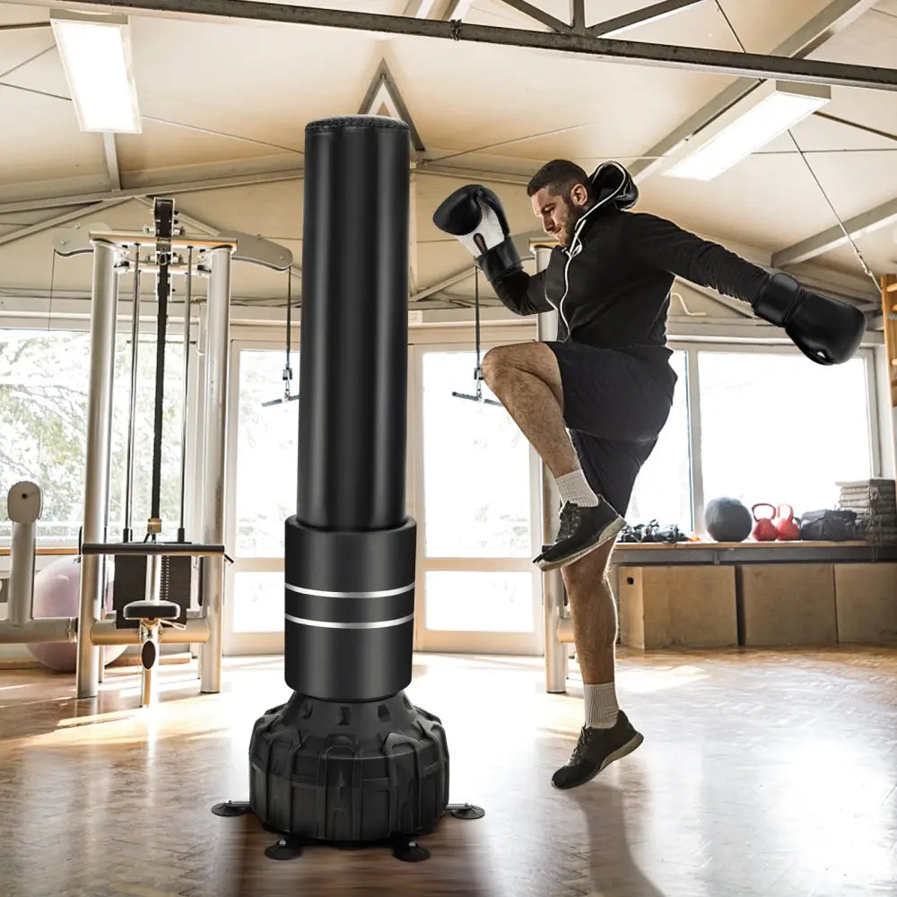 Freestanding Punching Bag 71 Inch Boxing Bag with 25 Suction Cups Gloves and Filling Base - Black - Boxing & Martial