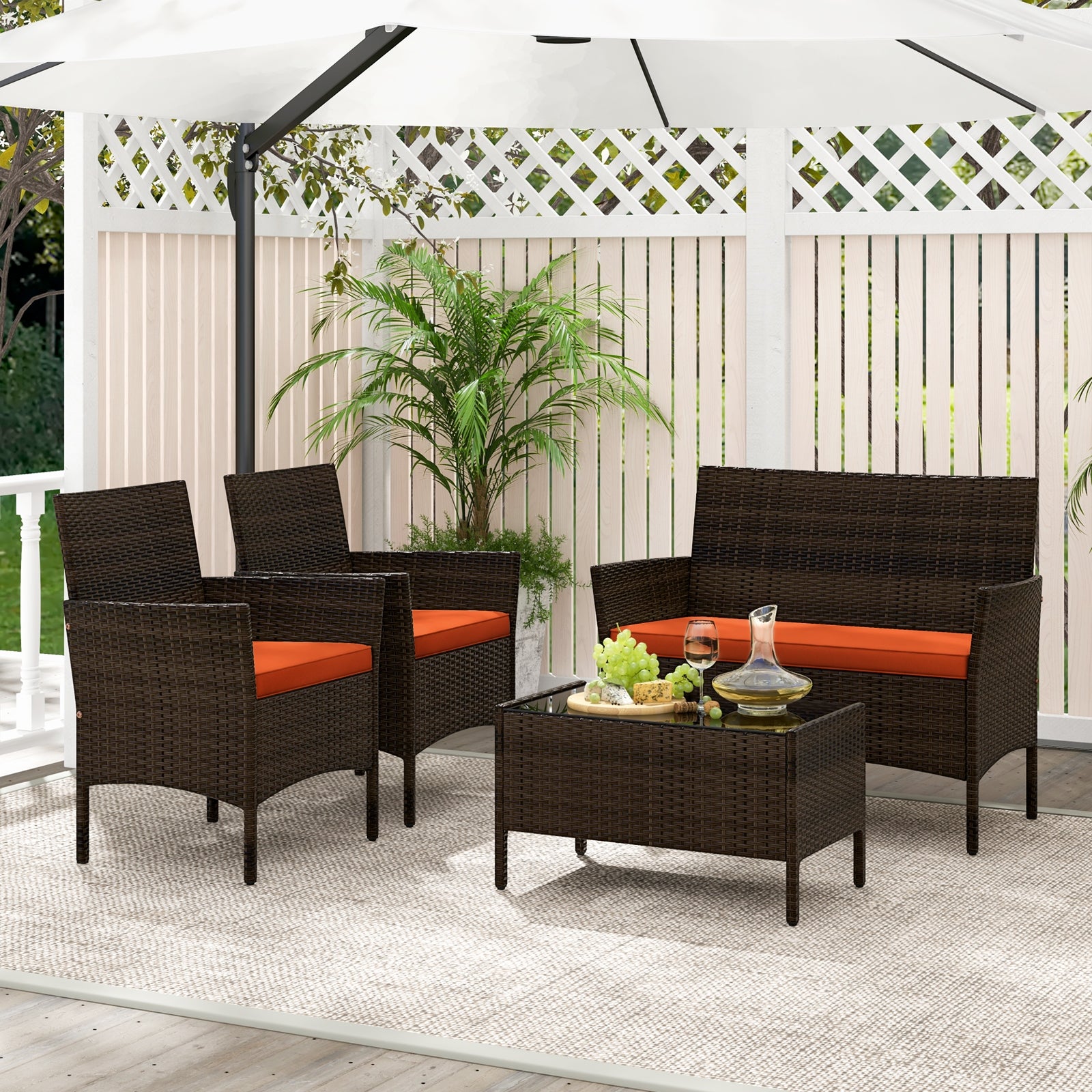 Ensemble de conversation de patio en rotin 4 pièces avec coussins d'assise confortables-Orange
