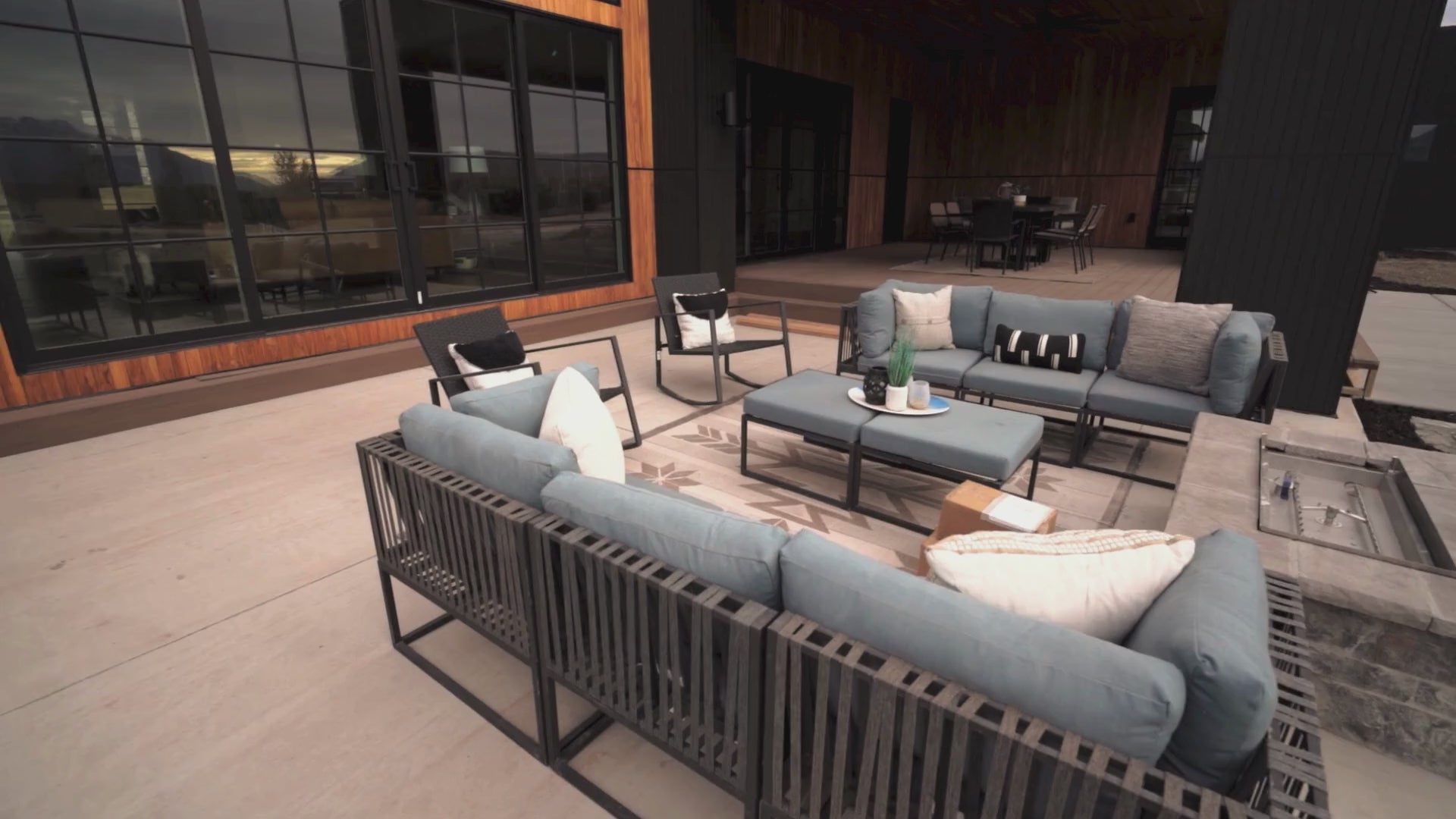 Load video: Video of patio and outdoor furniture.