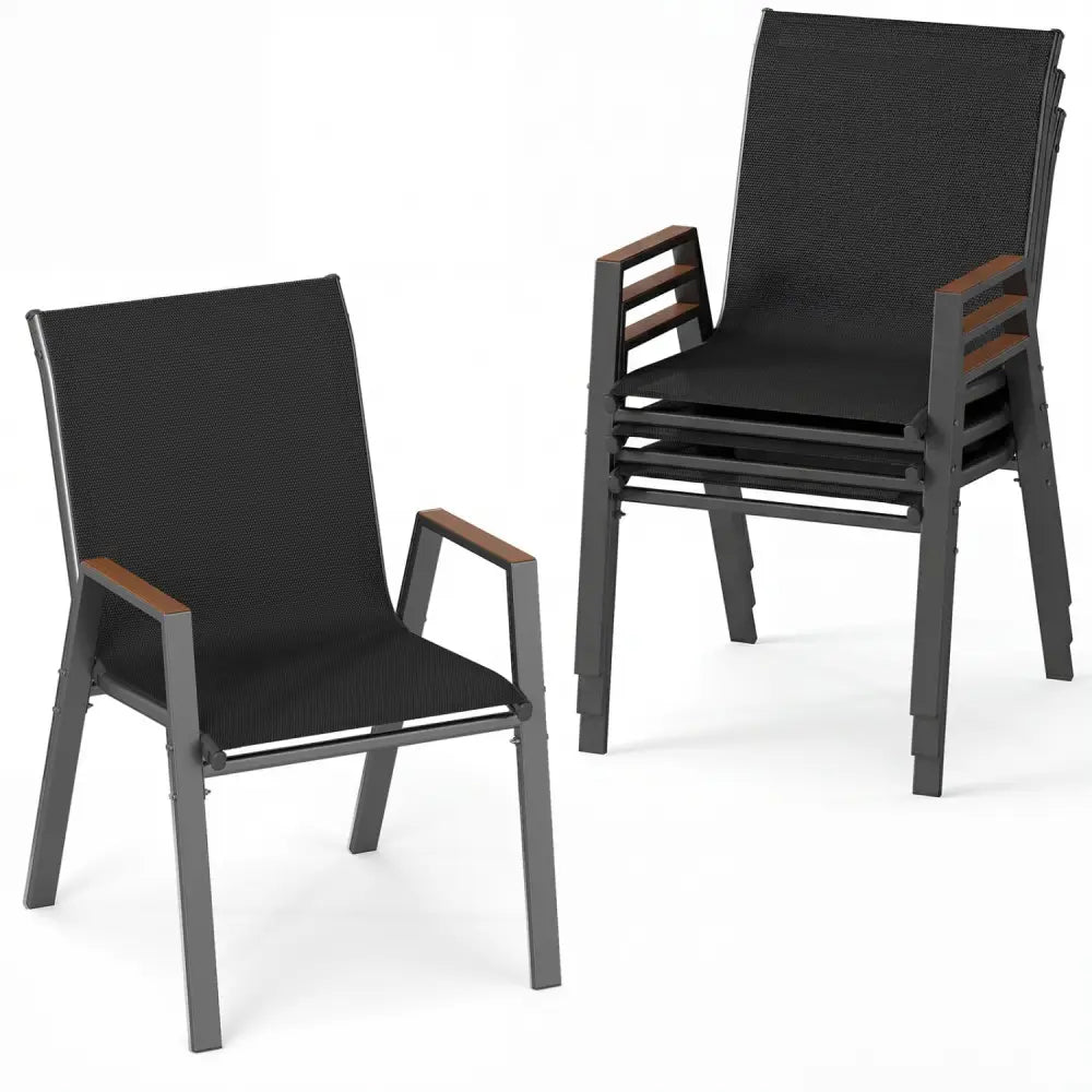 Two black chairs with wooden armrests on a white background