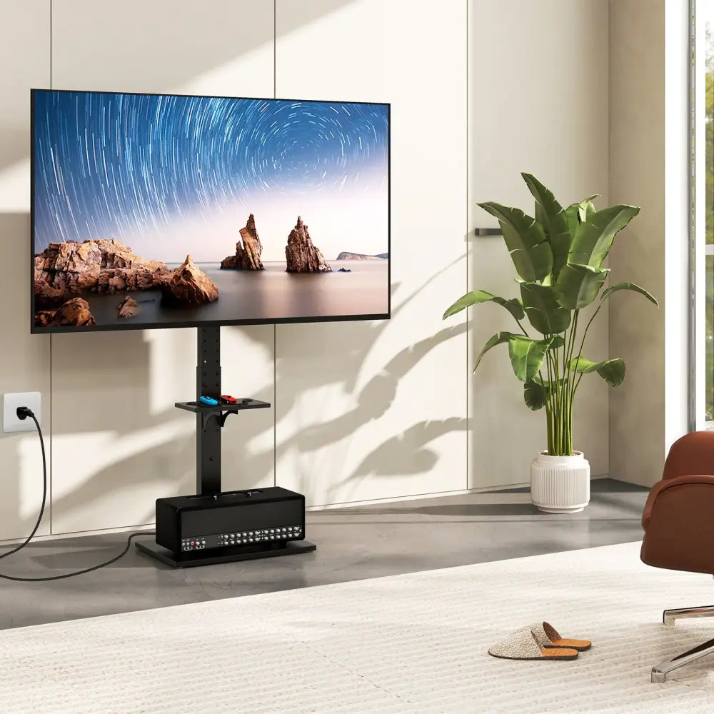 Tilt and Height Adjustable Floor TV Stand with Power Outlet and Adjustable AV Shelf - Entertainment Centers & TV Stands